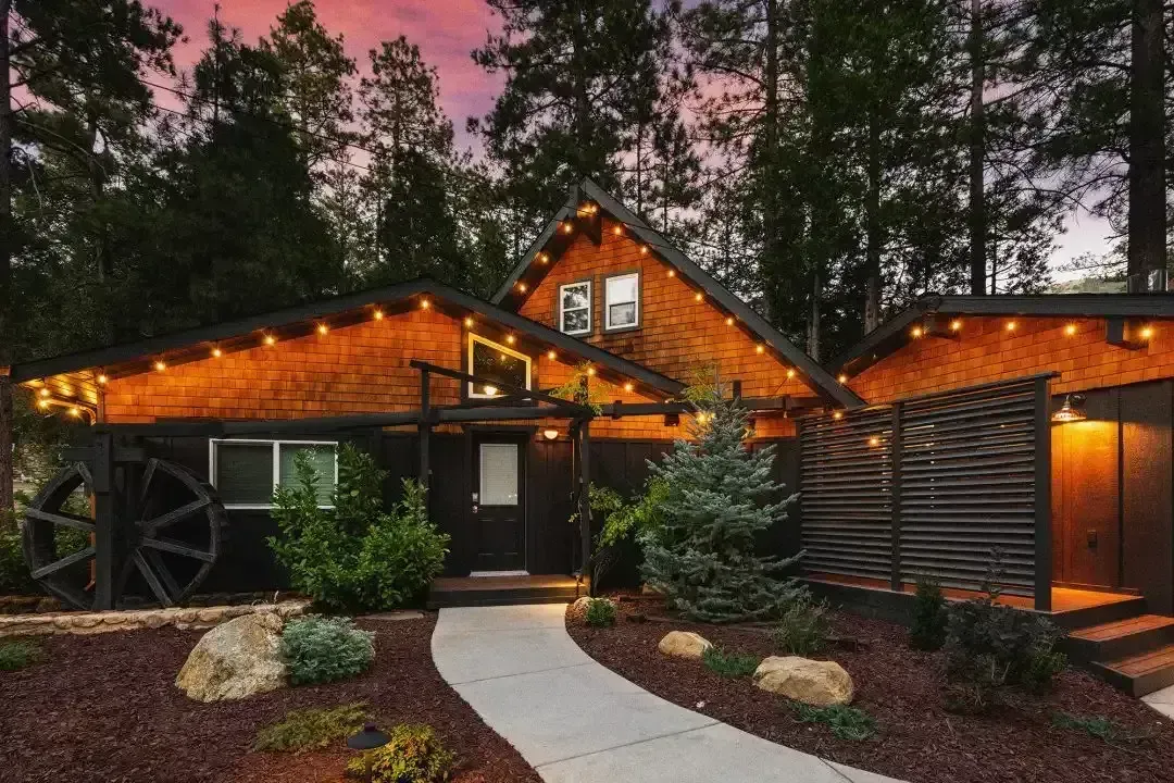 Cozy cabin exterior at dusk